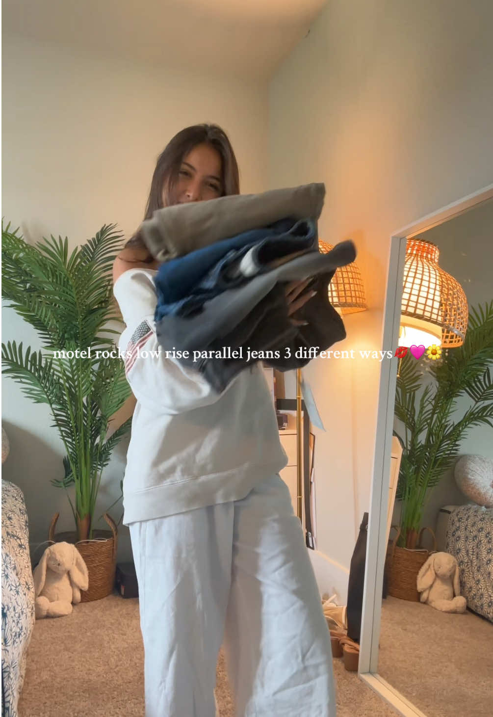 TikTok post by @talinebakr for MOTEL. Caption reads: Style @MOTEL low rise parallel jeans with me😁....