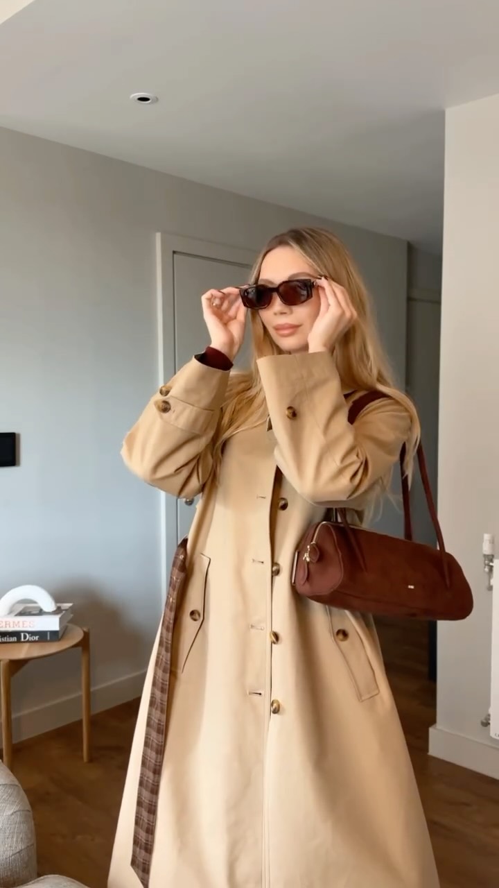 Instagram post by @natalia_m_m for Fabrique. Caption reads: A new season, a new trench from @fabrique.official....