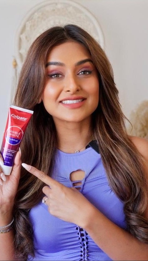 Instagram post by @pranwesha for Colgate. Caption reads: [...] too ✨ Step 0 of my beauty routine: Colgate....