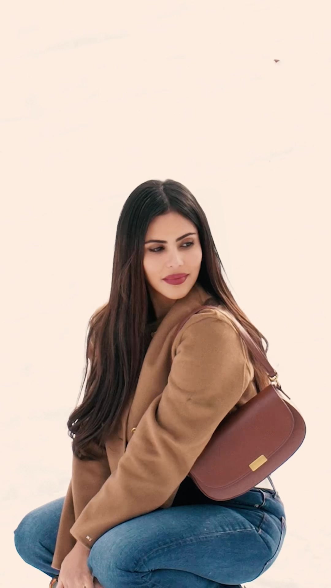 TikTok post by @nada_baeshen for Tommy Jeans. Caption reads: Its December ❤️my favourite time of year @Tommy....