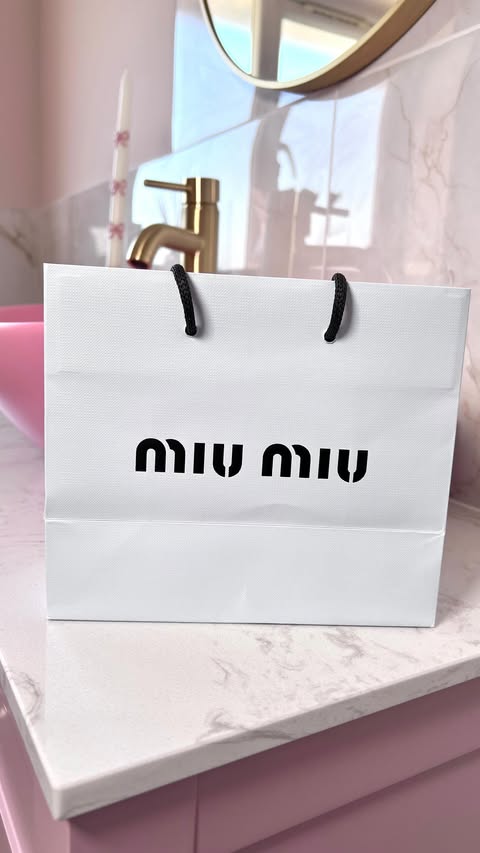 Instagram post by @georgiachan1 for Miu Miu. Caption reads: New from @miumiu 🍓✨ Featuring Miu Miu Miutine Eau....