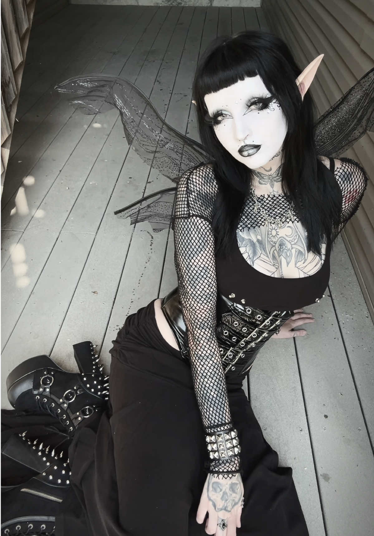 TikTok post by @horrorhailey for Demonia Cult. Caption reads: did a fairy look 🖤 shoes from @Demonia Cult tank....