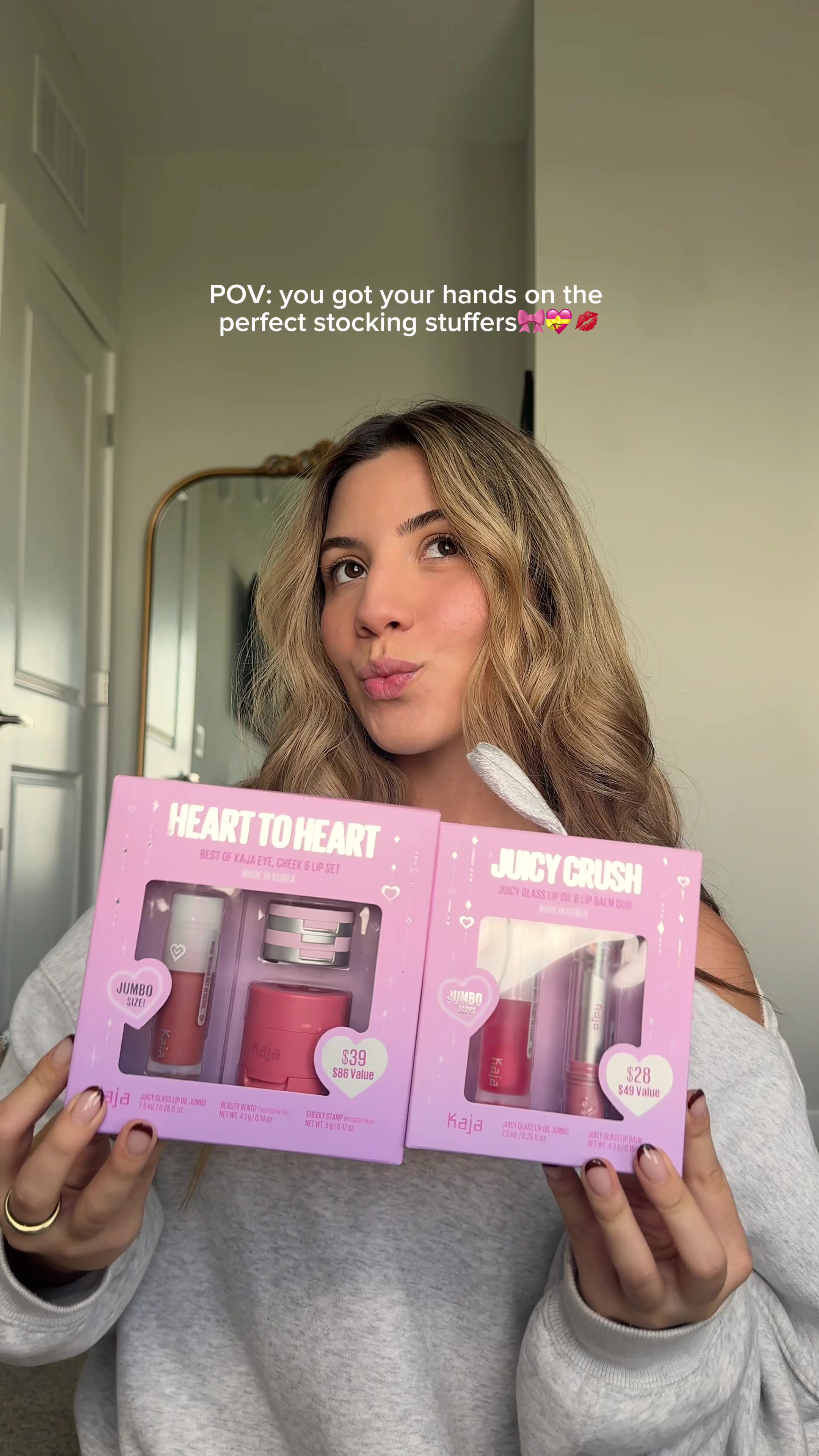 TikTok post by @valerieescobar for Kaja Beauty. Caption reads: @Kaja Beauty the holiiday sets of my dreams☁️🎀....