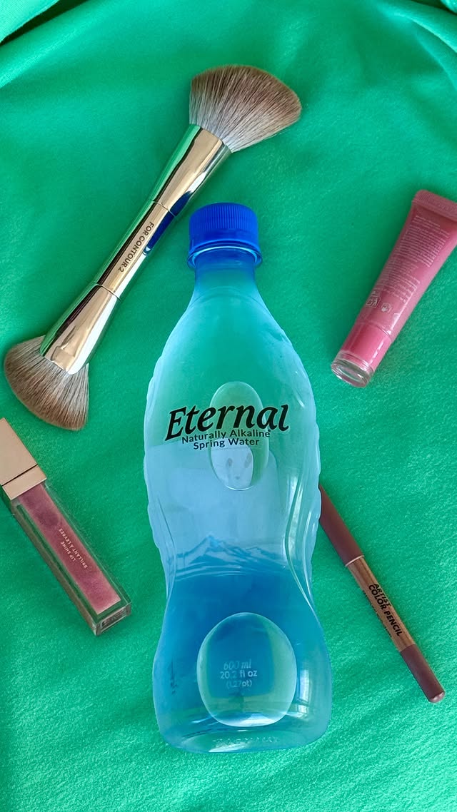 Instagram post by @allisonkayeglam for Eternal Water. Caption reads: [...] lip products & my favorite water 💦....