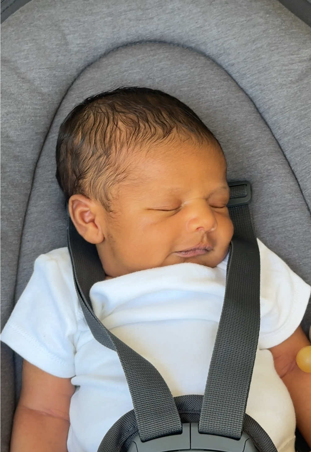 TikTok post by @thegrimwadefamily for Maxi-Cosi. Caption reads: Safe to say we are in love 🫶🏾 #babyswing #cassia....