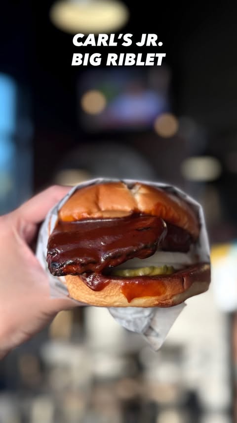 Instagram post by @mshangryfoodie for Carl's Jr.. Caption reads: For all the rib sandwich lovers, @carlsjrca has a....