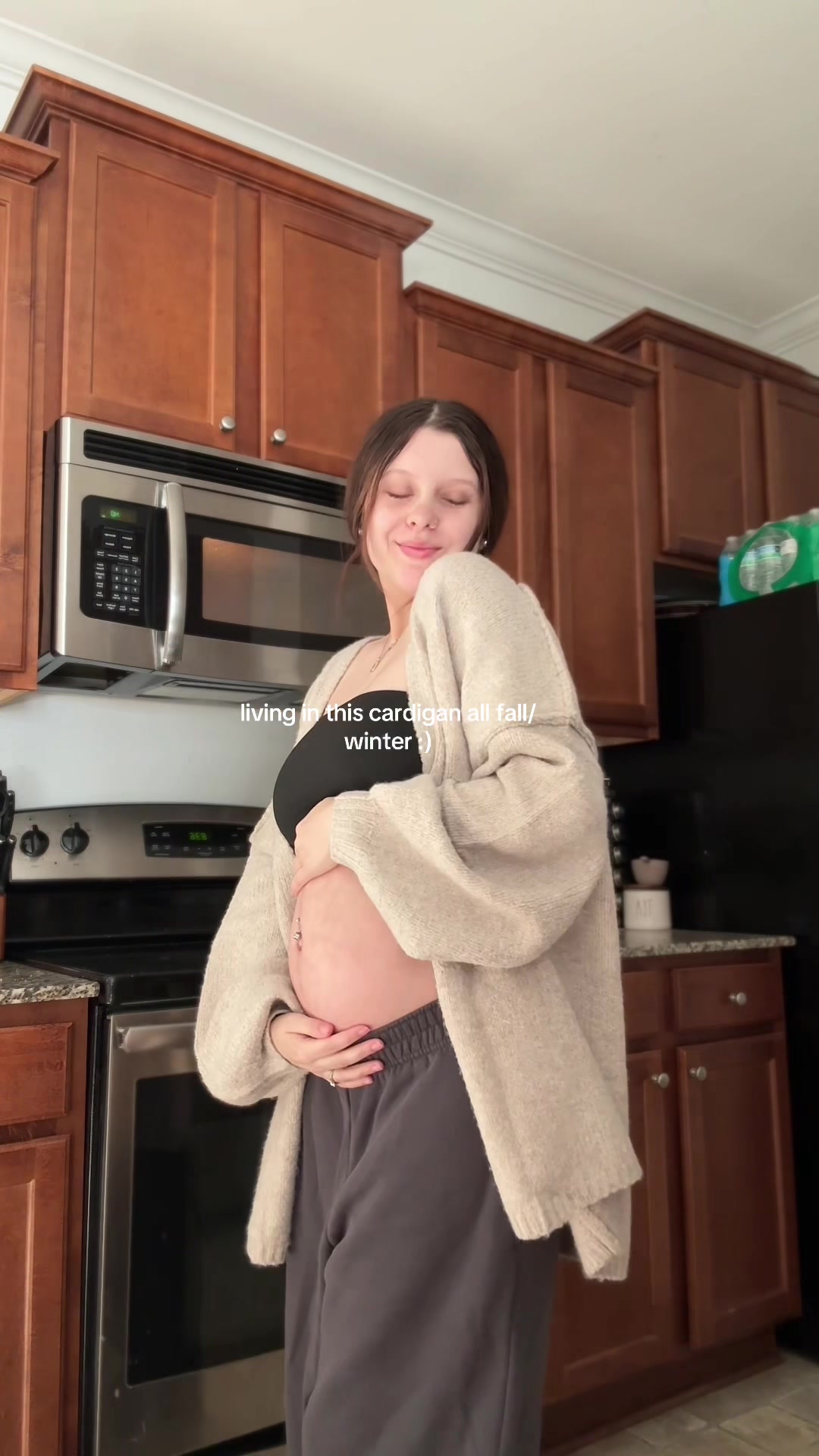 TikTok post by @earon_henbest for PrettyGarden. Caption reads: living in this! @PrettyGarden  #cardigan....