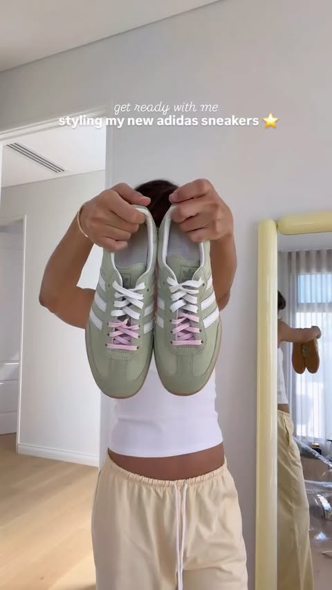 Instagram post by @kikalateefff for JD Sports. Caption reads: [...] green AND pink, a fave colour combo 🍵....