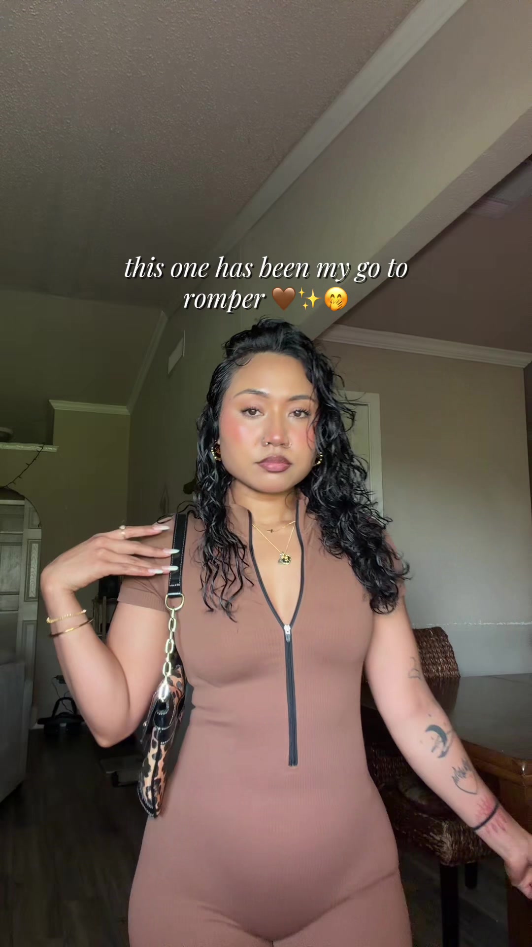 TikTok post by @milaveukiso for OQQ. Caption reads: [...] 🤎🫶🏽✨ . #romper #rompers #romperstyle #oqq....