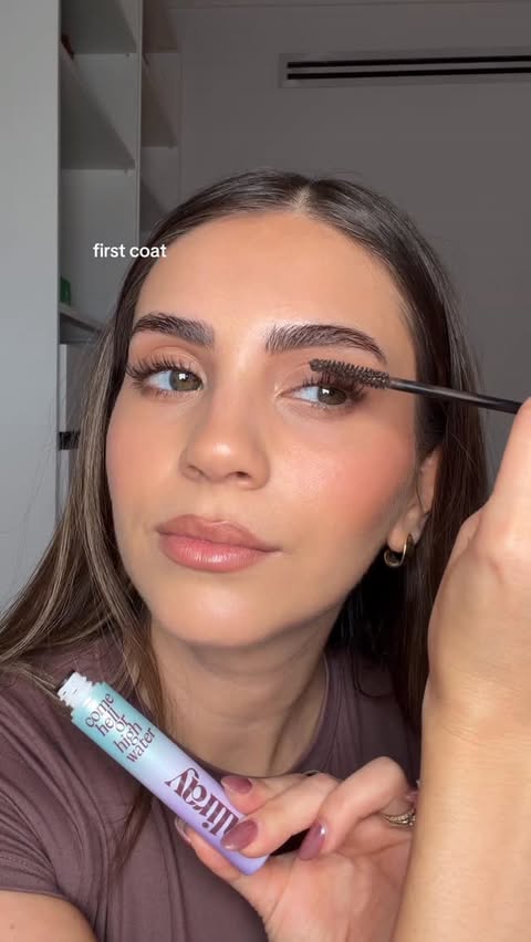 Instagram post by @meliscifcili for Caliray. Caption reads: brown mascara >>> @caliray come hell or high water....