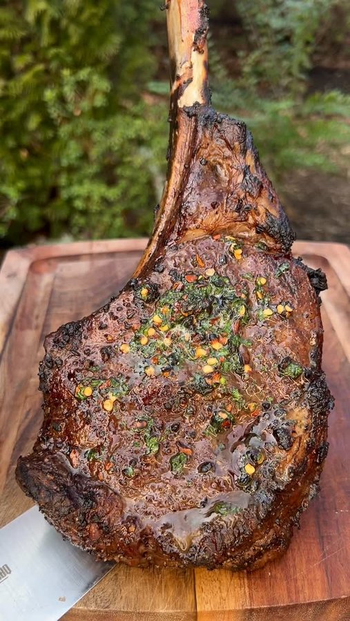 Instagram post by @bacusbbq for Kingsford. Caption reads: Tomahawk Tuesday 🥩. Part 16. 

One killer slice....