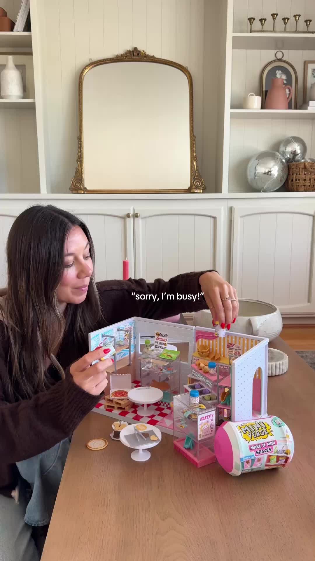 TikTok post by @debtrette for Miniverse. Caption reads: #ad Busy designing! Introducing Make It Mini....