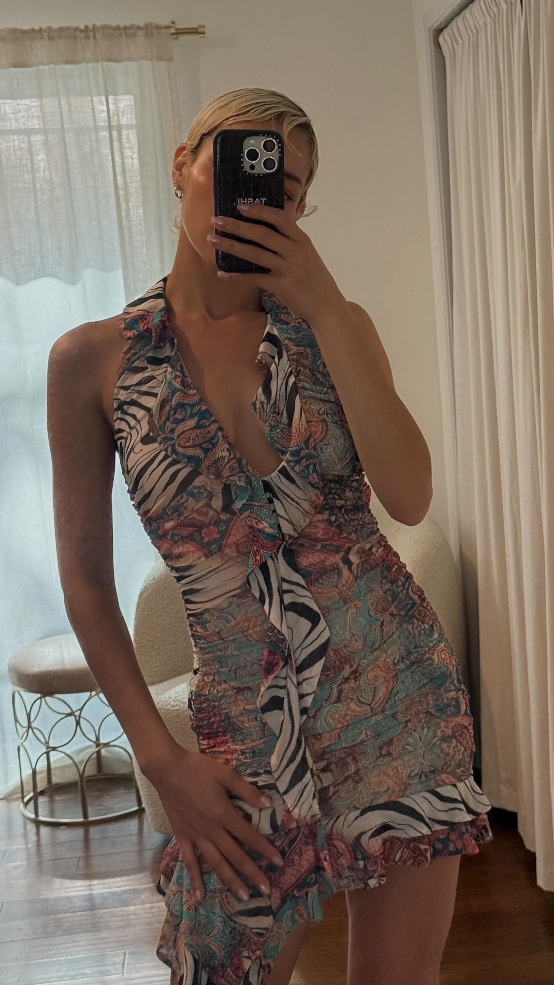 Instagram post by @tashimrod for AFRM. Caption reads: [...] get dressed for a girls night with....