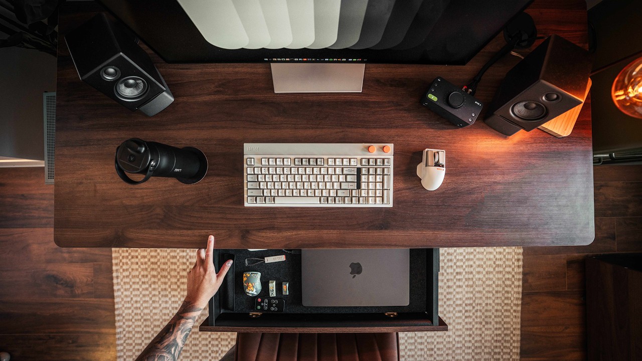 YouTube post by @andresvidoza for GRAMS28. Caption reads: 11 Desk Setup Accessories Upgrades that ACTUALLY....