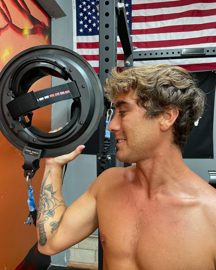 Instagram post by @koarothman for Iron Neck. Caption reads: [...] of mine is having a strong neck.....