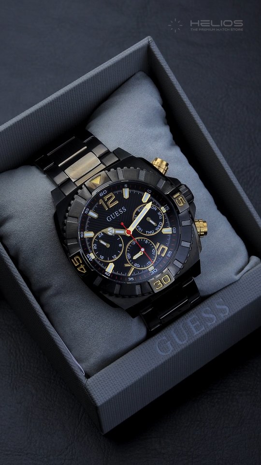 Instagram post by @helioswatches for GUESS Watches. Caption reads: A statement in gunmetal. 
This @guesswatches men’s....