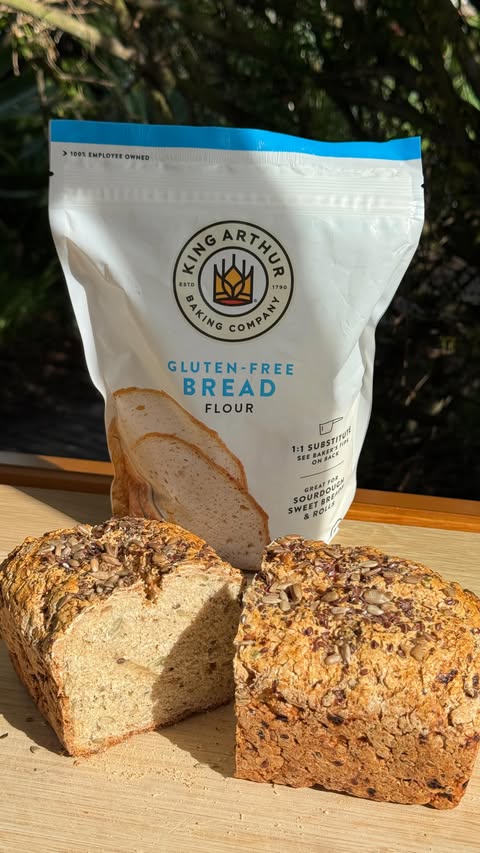 Instagram post by @eat.glutenfreewithme for King Arthur Baking Company. Caption reads: This GF Bread Recipe is ACTUALLY beginner-friendly....