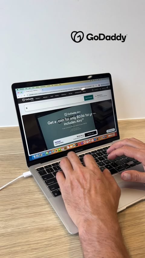 Instagram post by @bill.michael.goldsmith for GoDaddy. Caption reads: [...] how your business is perceived. I use....