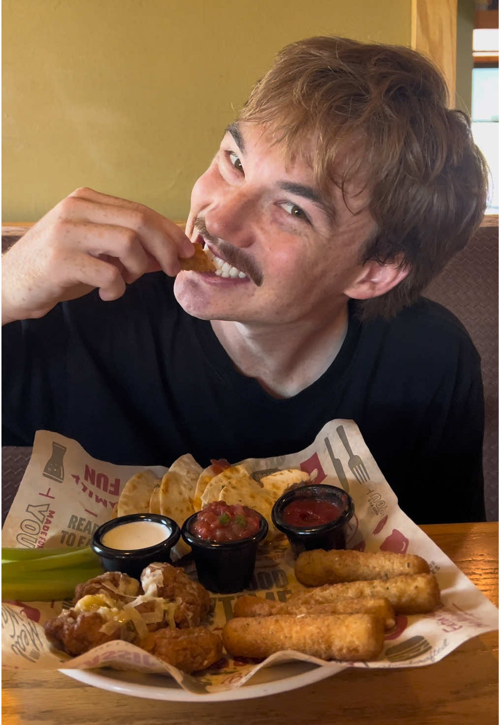 TikTok post by @cadenruns for Applebee's. Caption reads: over under Applebee’s Ultimate Trio run!....