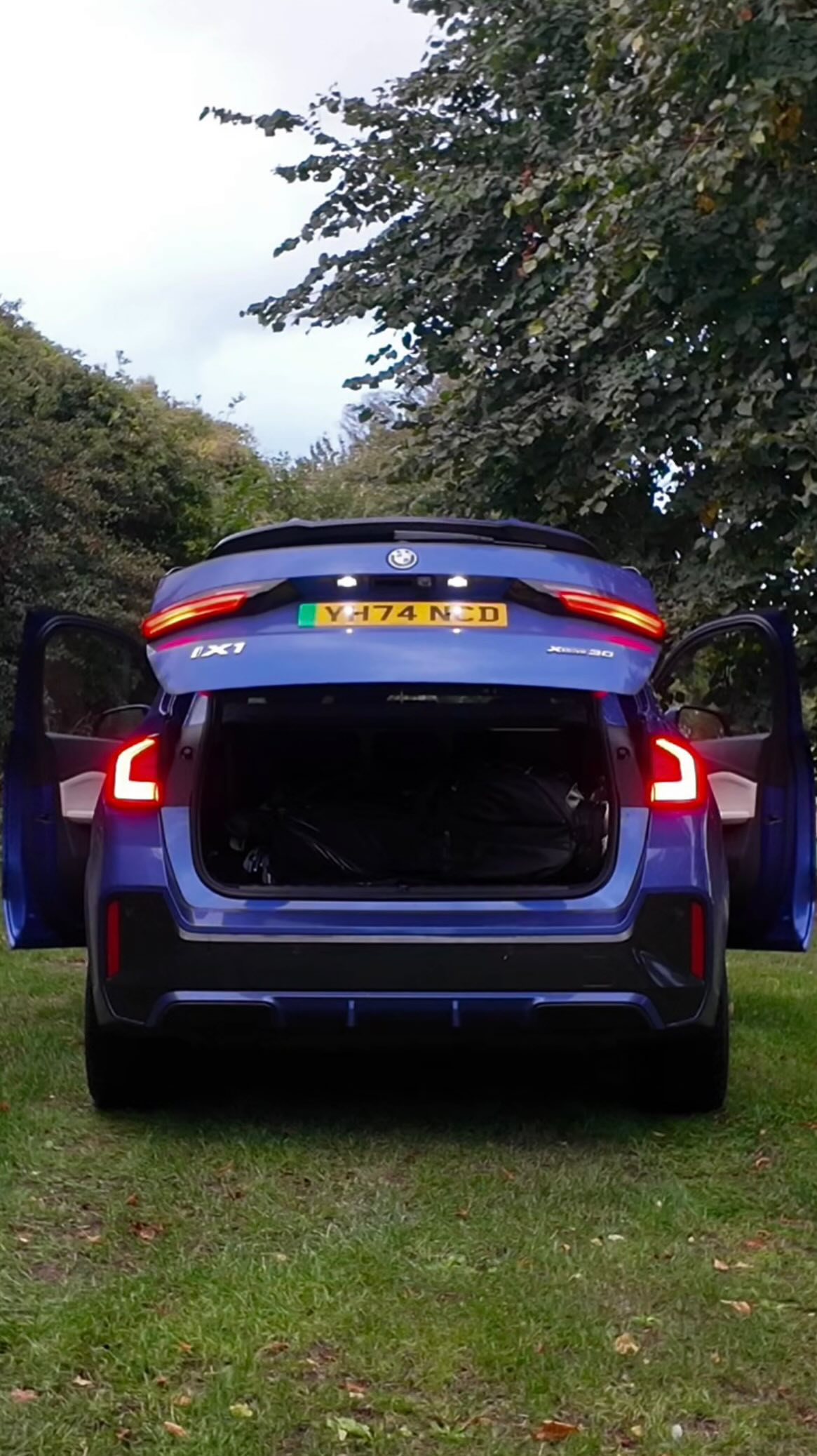 Instagram post by @maxandharrygolf for BMW. Caption reads: Come behind the scenes as we create a viral golf....