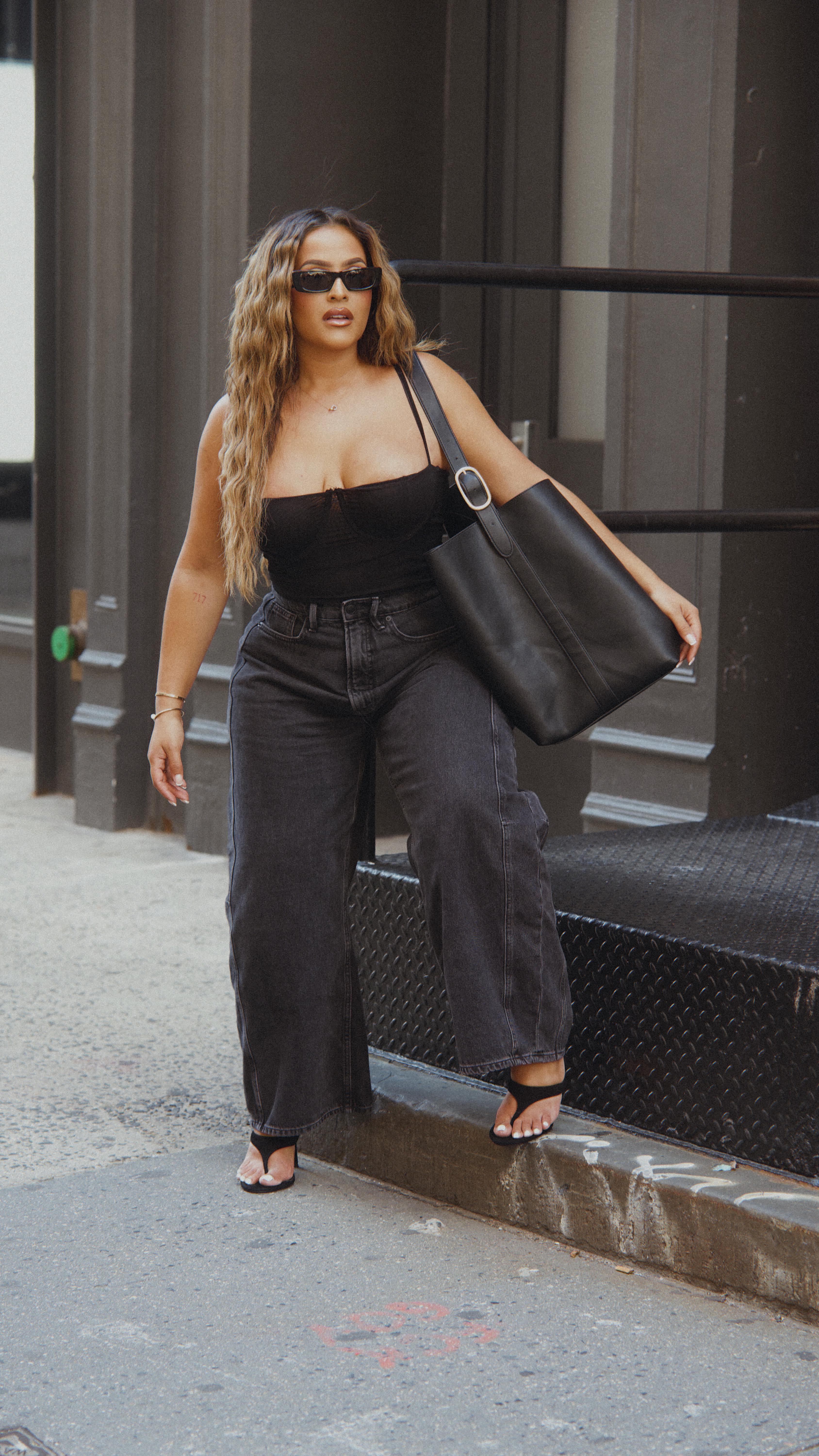 Instagram post by @kristalheredia for SPANX. Caption reads: Spanx new Authentic 360 Denim collection is for....