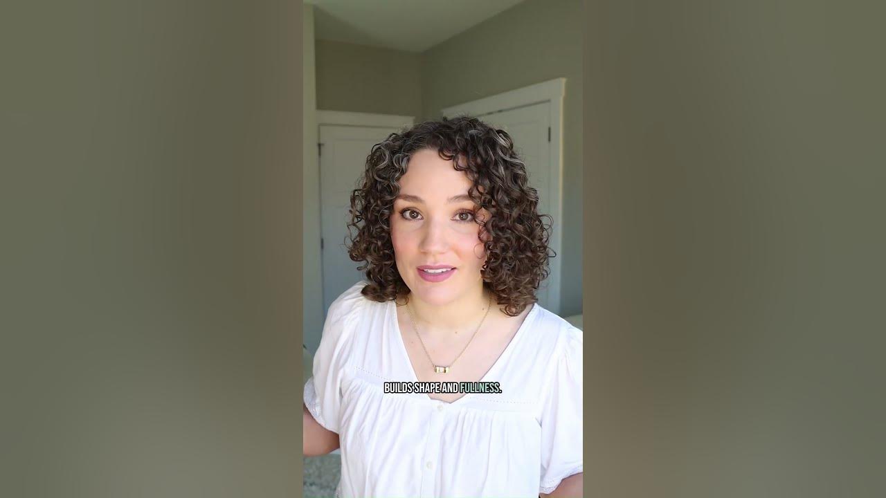 YouTube post by @GenaMarie for BounceCurl. Caption reads: [...] for 10% off the new @BounceCurl brushes +....