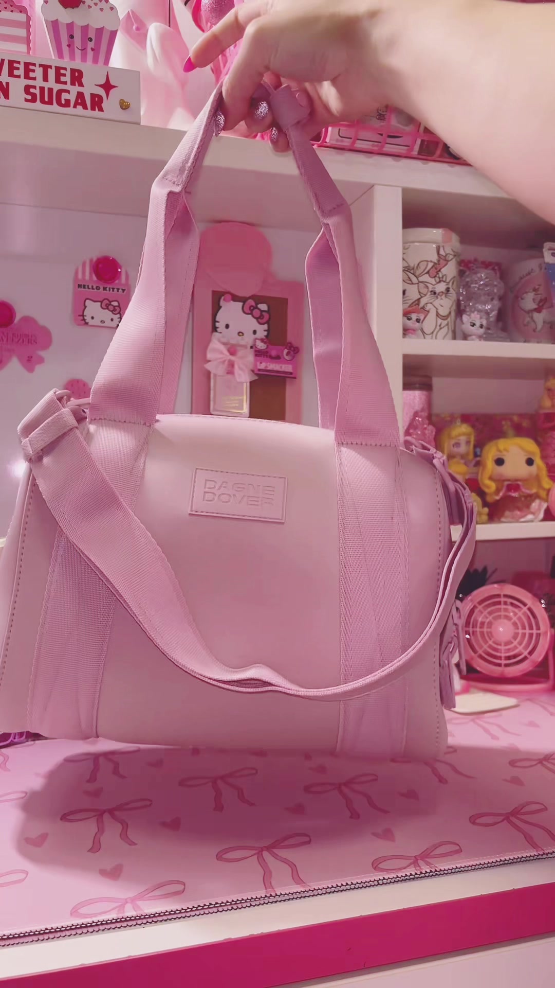 TikTok post by @pinkeverything17 for Dagne Dover. Caption reads: She’s so pretty !!! Love this @Dagne Dover bag!!....