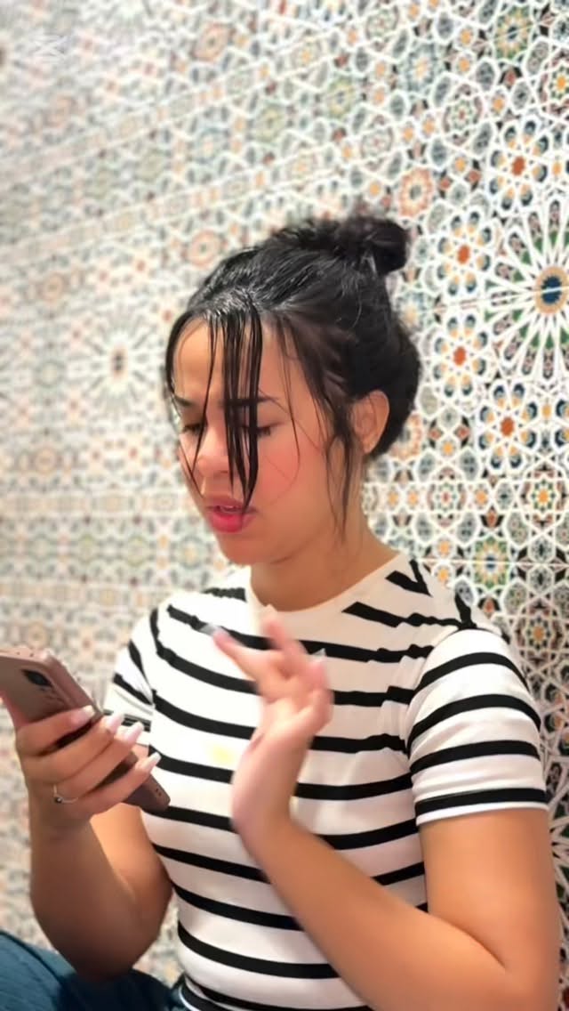 Instagram post by @meriam_hrm for Tecnomobile. Caption reads: #TECNOmaroc #TECNO #spark40pro #AFCON2025....