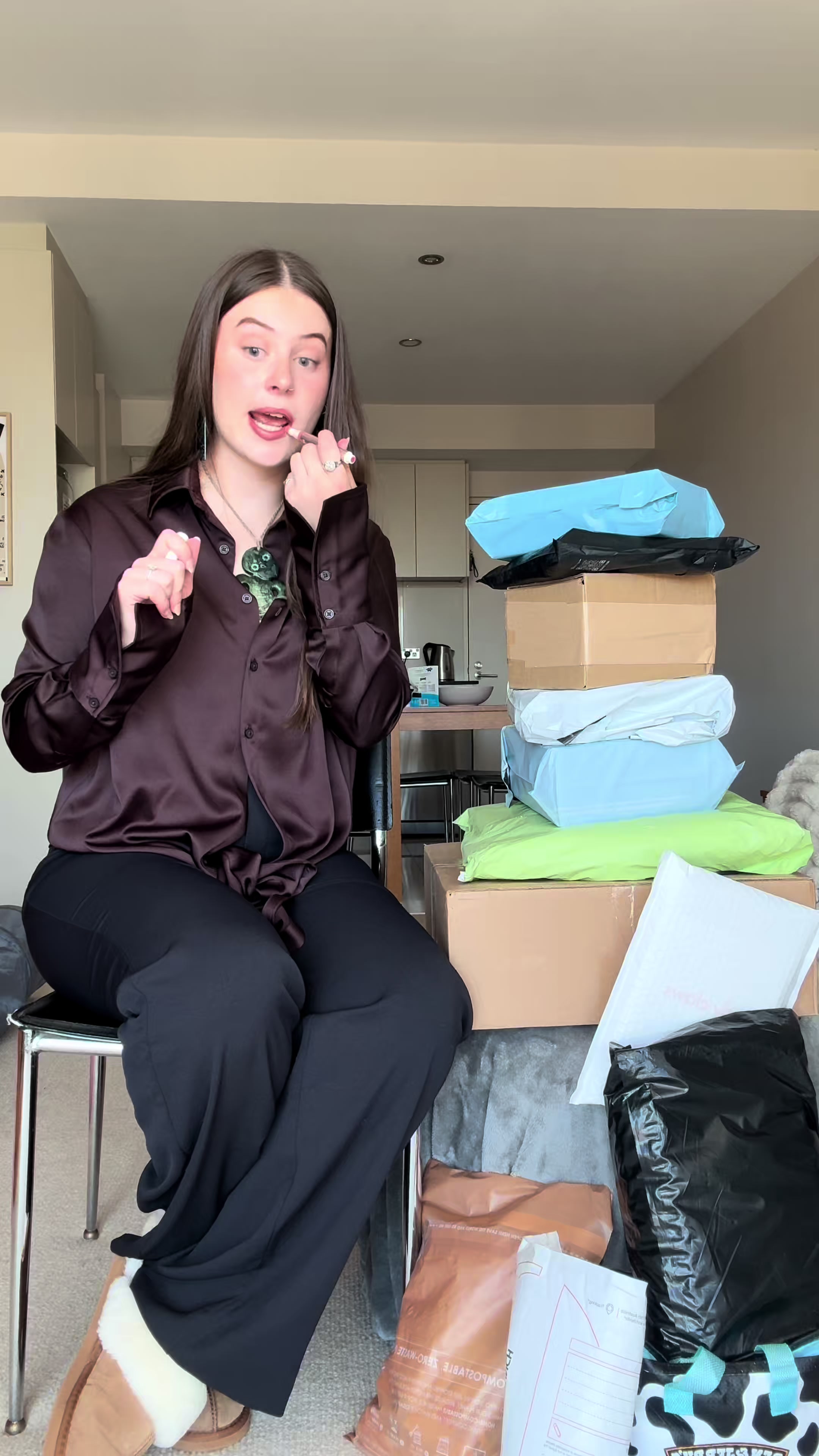 TikTok post by @geooojones for BURGA. Caption reads: Grateful, chaotic & slightly unhinged 🤭 #unboxing....