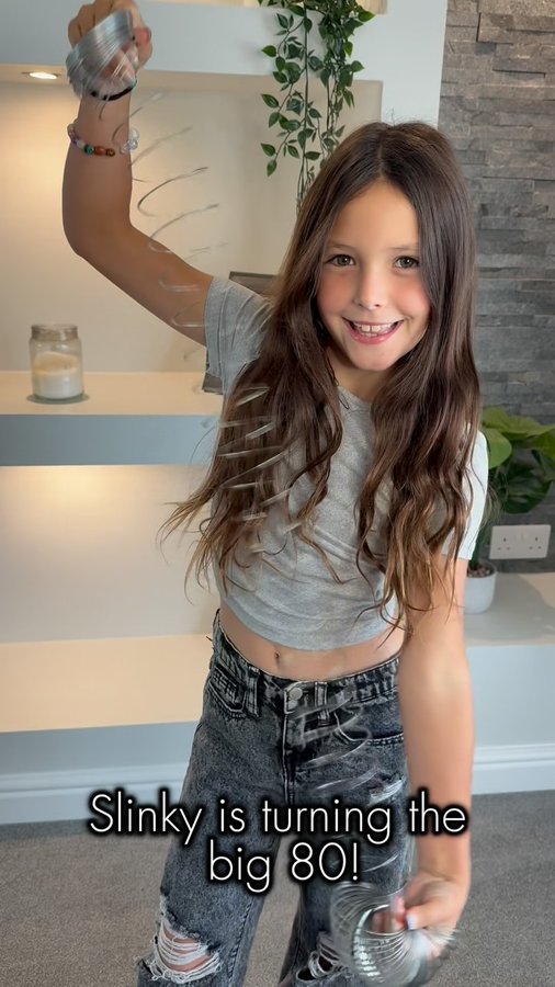 Instagram post by @adventures_withthehammonds for The Entertainer. Caption reads: #AD Happy 80th Birthday to the one and only Slinky....