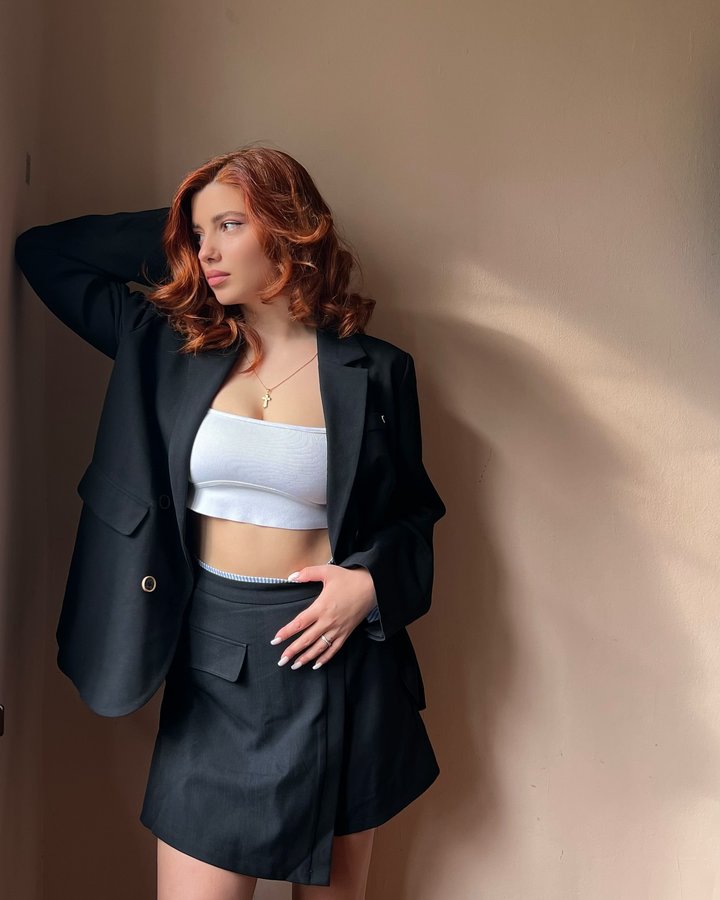 Instagram post by @dianatevzadzee for Kuoser. Caption reads: Blazer & Skirt @kuose_official_ 
Bag....