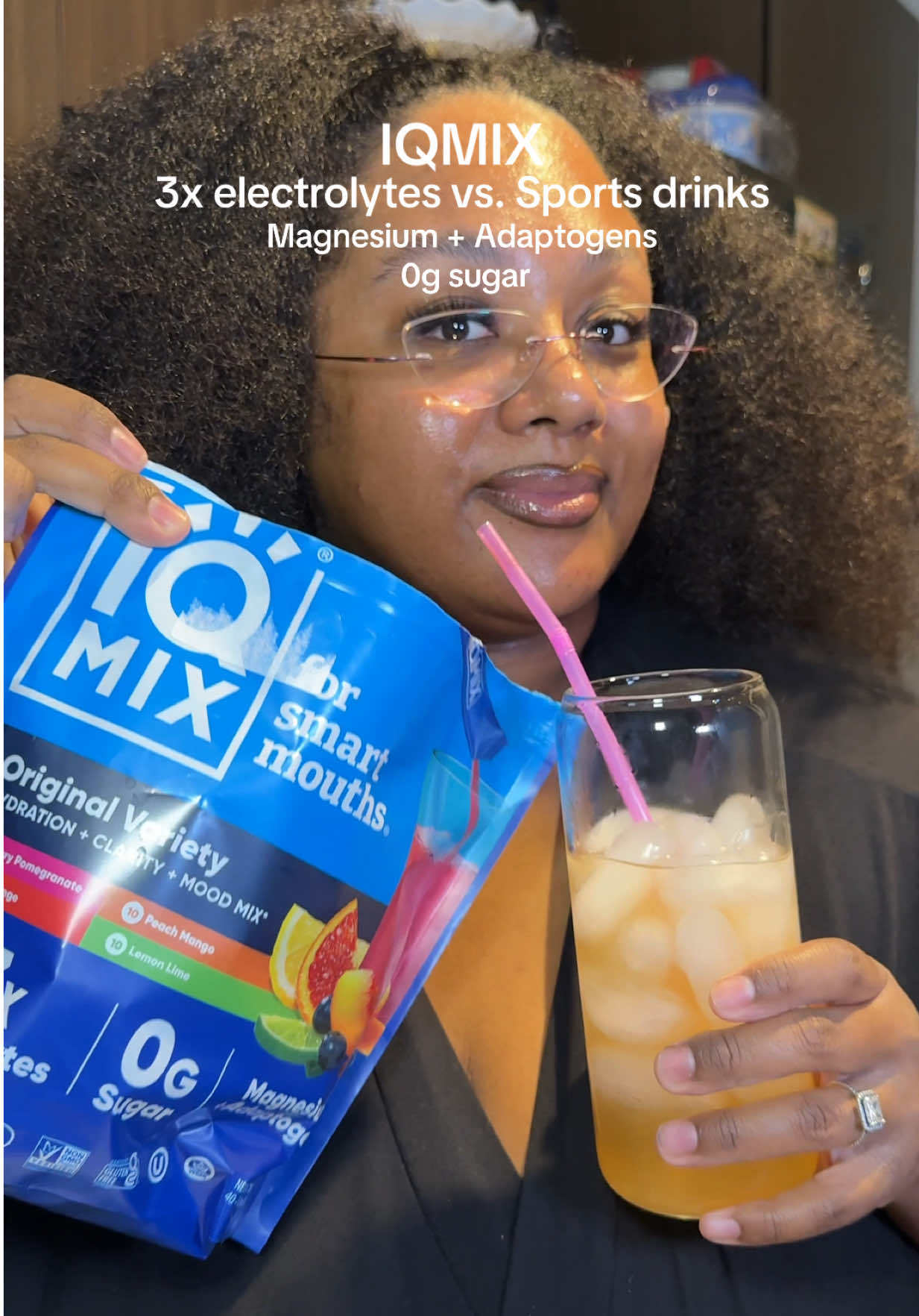 TikTok post by @alexismoniquefern for IQBAR. Caption reads: Im OBSESSED with IQmix @SHOP IQBAR 🥭🍑🍍🍋🫐....