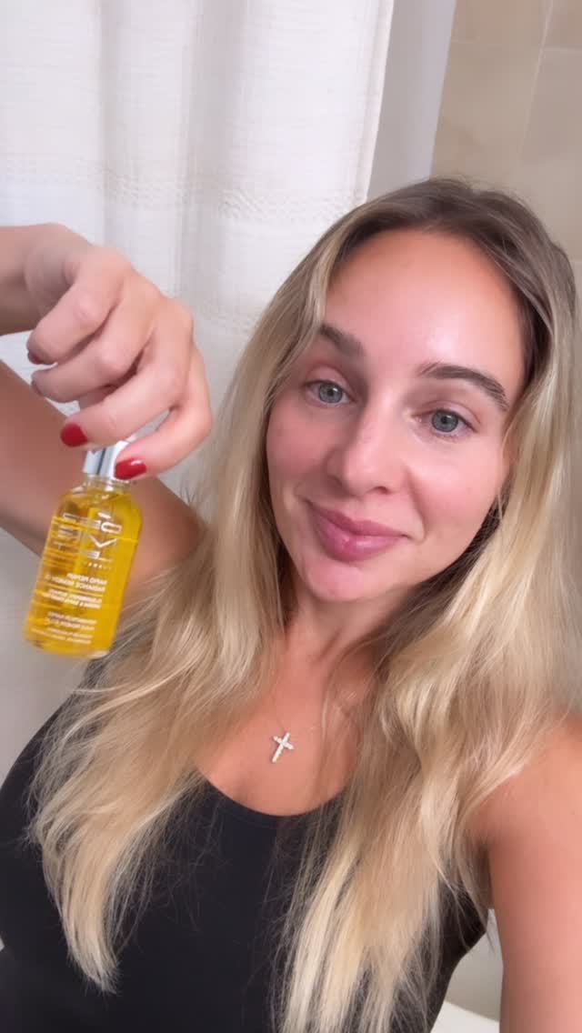 Instagram post by @peedi_c for Dermelect. Caption reads: 💛 face oil is life @dermelect . . . #ad....