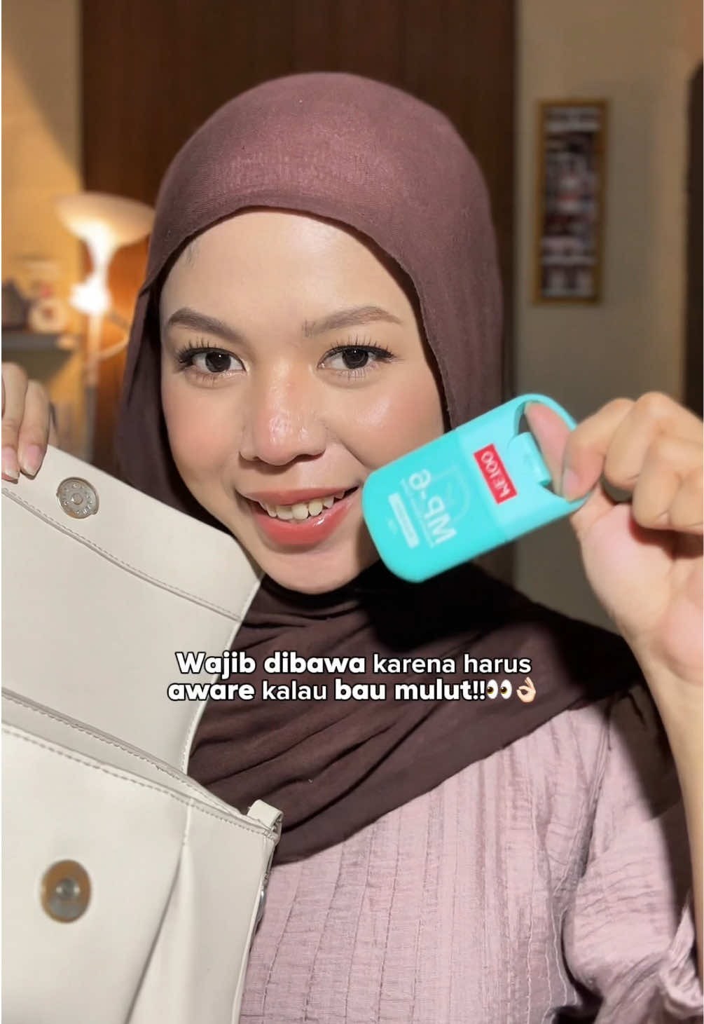 TikTok post by @sanshiners for Metoo Beauty. Caption reads: selain makeup, mouth spray @Metoo Beauty wajib ada....