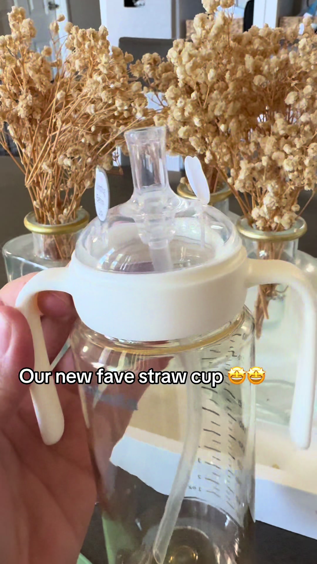 TikTok post by @seleeennnaaaa for mombella official. Caption reads: A great cup for transitioning your baby to a straw....
