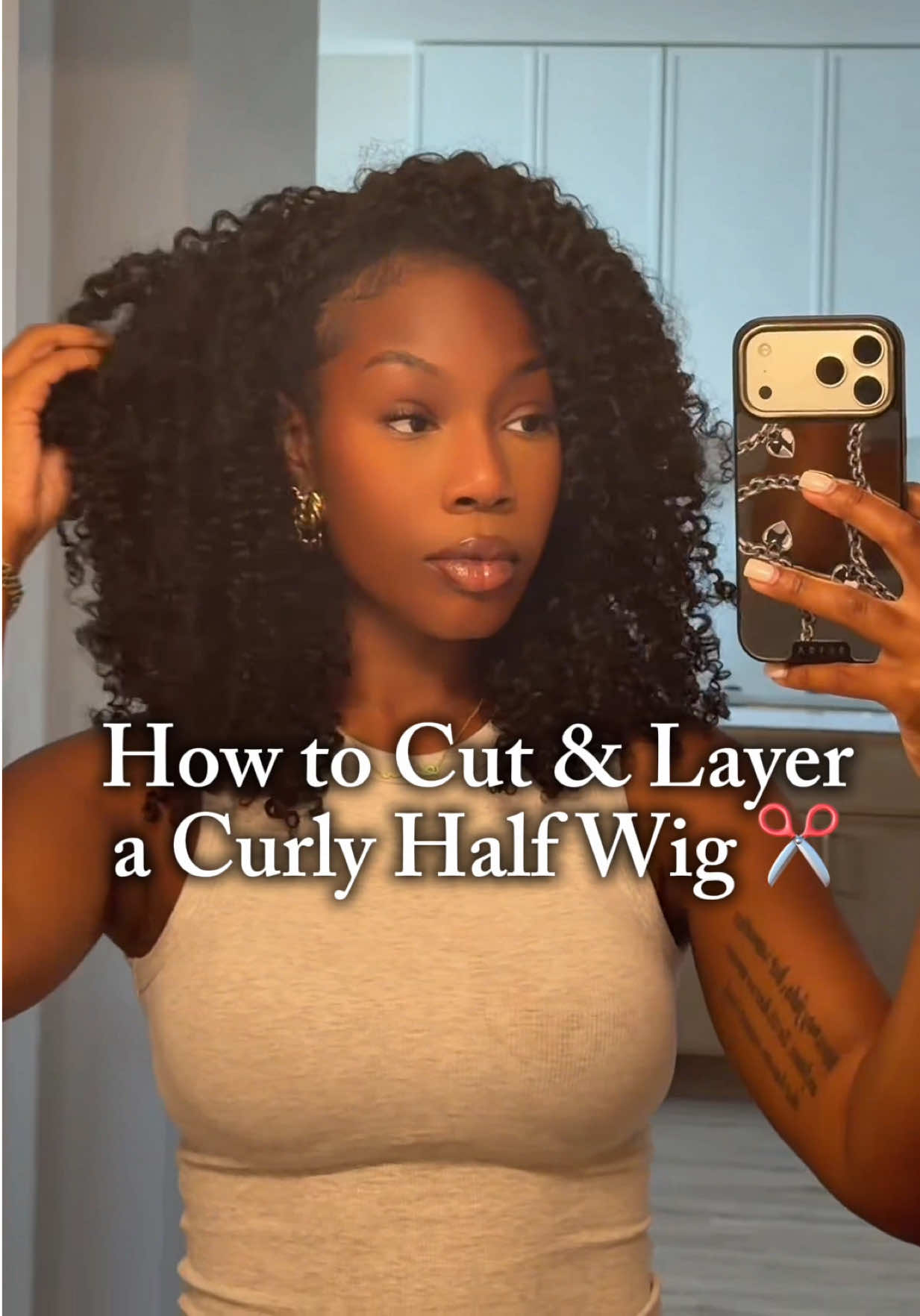 TikTok post by @theyadore_amber for ISEE Hair. Caption reads: [...] me! #curlyhairtutorial #layeredhaircut....