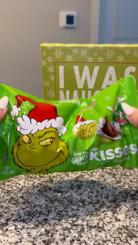 Instagram post by @katiesazkitchen for Hersheyland. Caption reads: A little chaotic candy refill, just the way the....