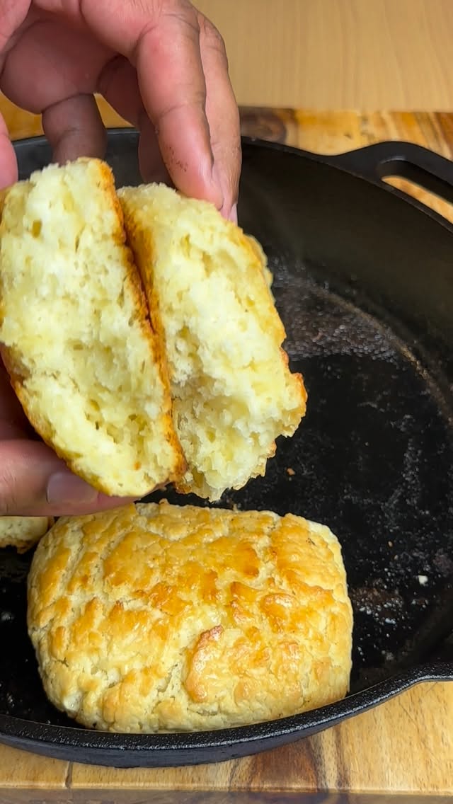 Instagram post by @theflavors for King Arthur Baking Company. Caption reads: 🥣✨ Homemade biscuits fresh from the oven —....