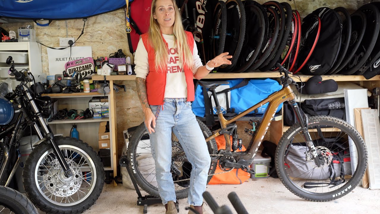 YouTube post by @JulietElliottsChannel for Hiplok. Caption reads: Garage Tour: My New Bike, Our Motorbikes, & How We....