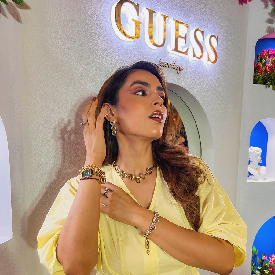 Instagram post by @thattrendstalker for GUESS Watches. Caption reads: An evening of jewellery and watches stealing the....