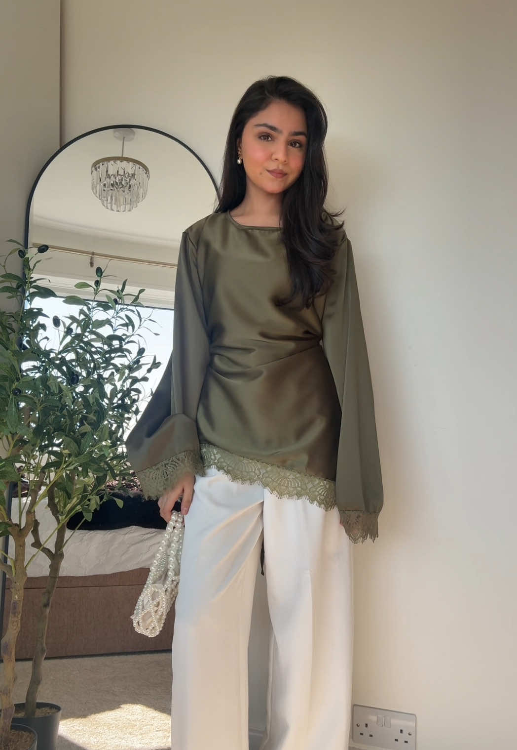 TikTok post by @iitszainabb for emlavish. Caption reads: [...] #spring #springoutfitinspo @emlavish.