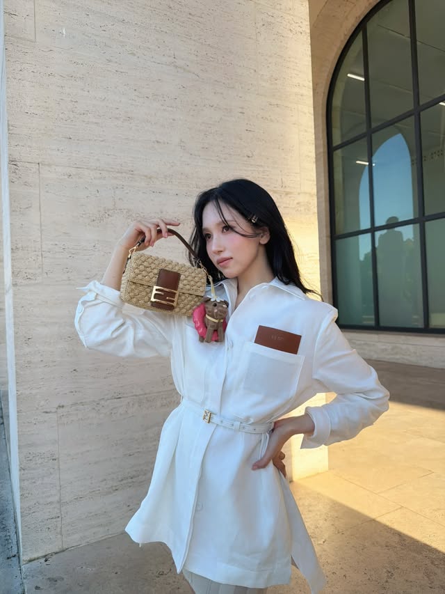 Instagram post by @mina_sr_my for Fendi. Caption reads: 🦢🤍 #Fendi #FendiPreFW26 #SponsoredbyFendi #PR....