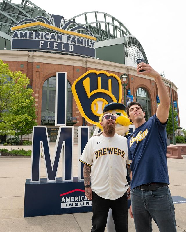 Instagram post by @adam_pawlak23 for American Family Insurance. Caption reads: We want to see your #BrewCrew! Tag @amfam and use....