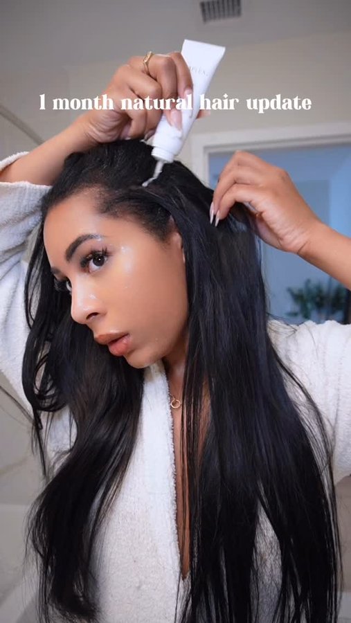 Instagram post by an influencer for OLAPLEX. Caption reads: [...] 👀 I’ve been using the NEW @olaplex Nº.0.5....