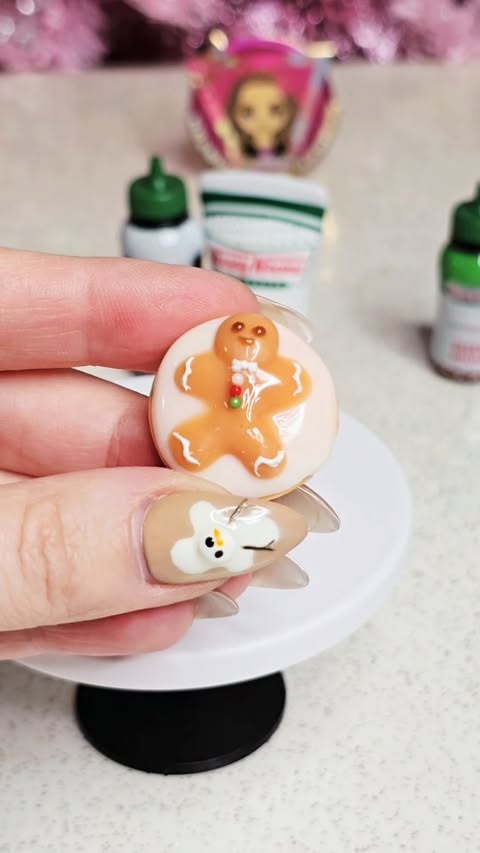 Instagram post by @tanjastoysreview for ZURU Toys. Caption reads: [AD]🎄 DIY GINGERBREAD MAN with Zuru Mini Brands....