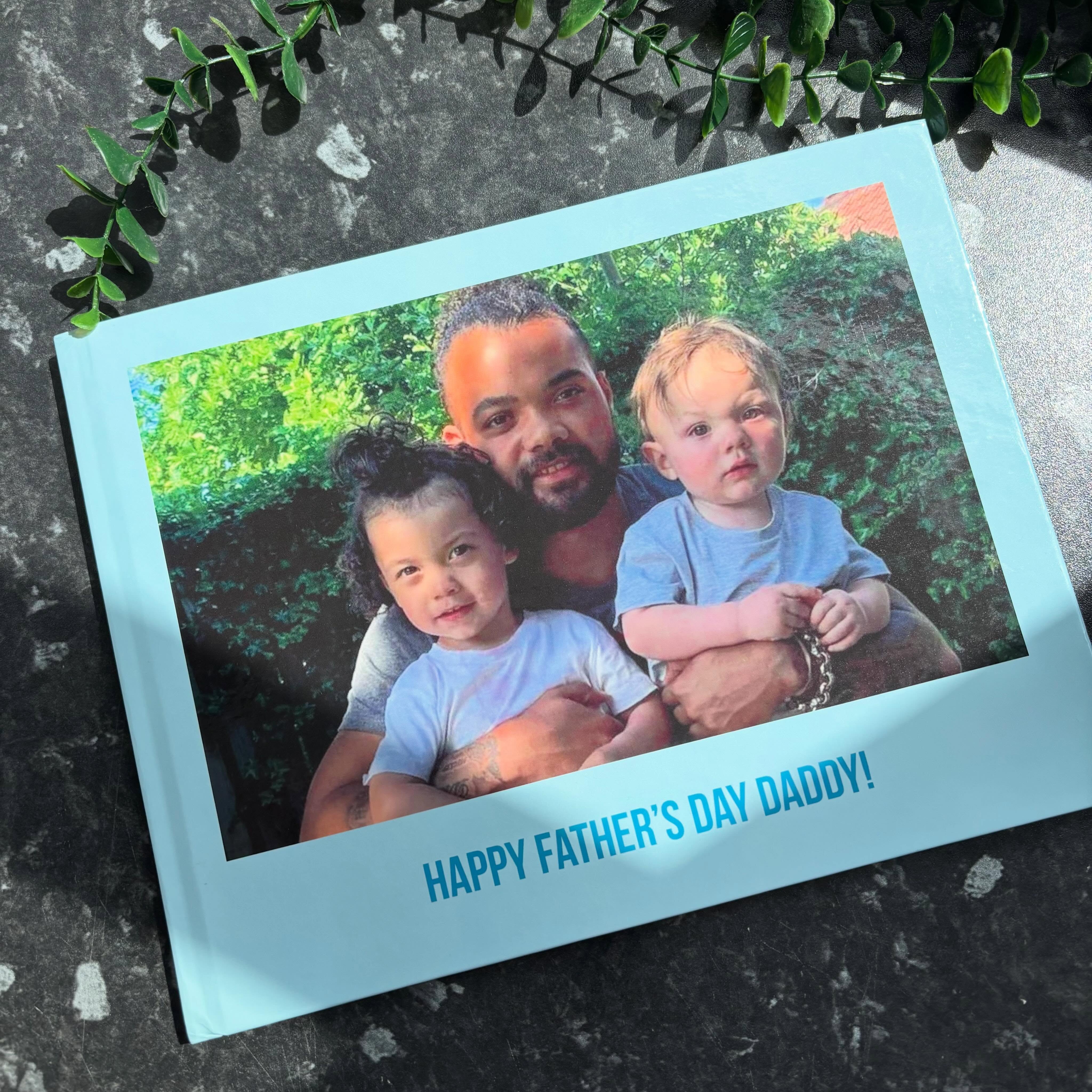 Instagram post by @lifewith_usx for Photobox. Caption reads: ad | @photoboxuk Fathers Day PhotoBooks 📷 I am in....