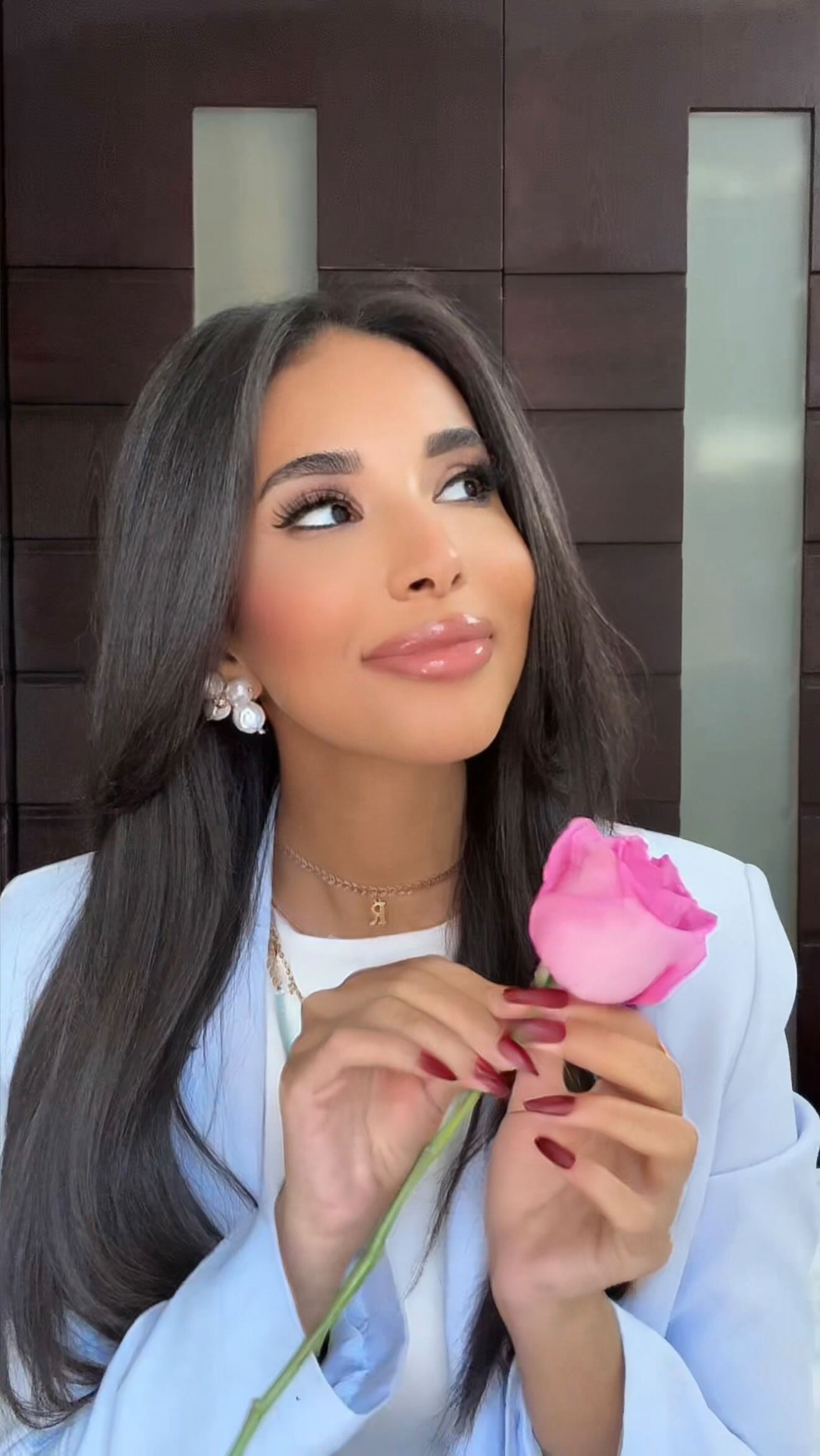 Instagram post by @dr.reem.mehany for DeFacto. Caption reads: Habibi yaa yaaa …….. 🎶All outfit from....