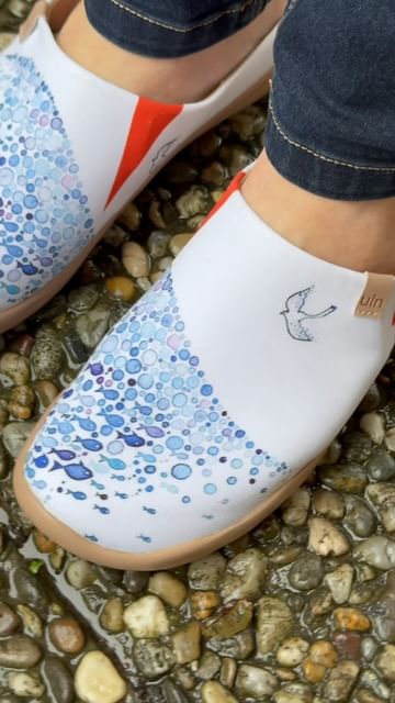 Instagram post by @waymorethan27dresses for UIN Footwear. Caption reads: Happy rainy saturday ☔️🐠
Shoes:  Pacific Time....