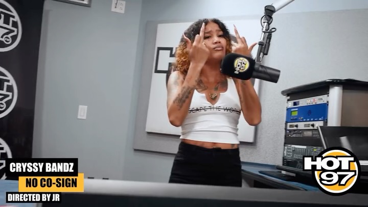 Instagram post by @cryssybandzz for HOT 97. Caption reads: Cryssy Bandz pulled up and put the station in a....