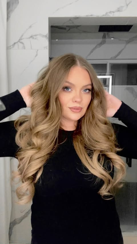 Instagram post by @briannafoxmakeup for BELLAMI Hair. Caption reads: [...] easy holiday hairstyle using the....